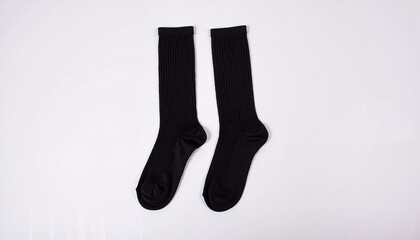 Pair of black ribbed socks with a neutral expression on a white background
