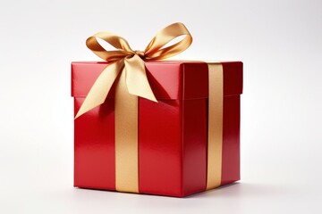 Obraz premium Red Gift Box with Gold Bow in Bright Studio Lighting