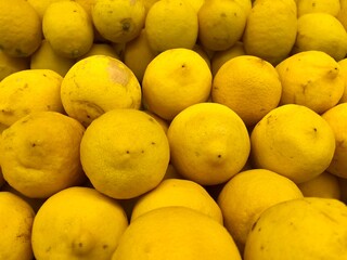 fresh and ripe lemon close up