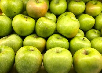 Lots of green apples. Background of apples. High quality photo