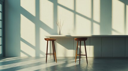 Minimal Kitchen Concept with Sunlit Counter and Wooden Stools in Modern Interior Design