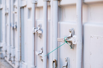 plastic seal on the latch of the container