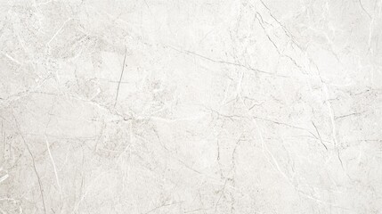 A close-up shot of a white marble surface with subtle veining.