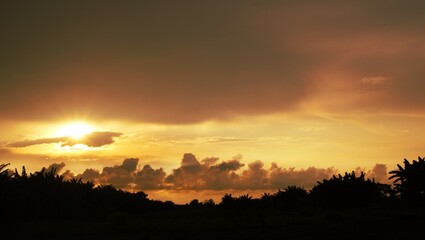 view of the clear afternoon sky, and blackish white clouds