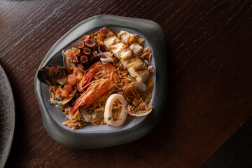 shrimp, octopus, salmon, mussel dinner plate