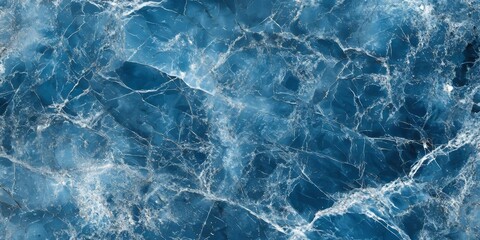 Obraz premium Elegant marble granite features a blue background wall surface with white patterns. This smooth stone slab offers a sophisticated tile texture, perfect for interior decoration or as a ceramic counter.