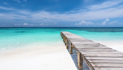 Obraz premium Summer vacation background with wooden pier on a white sand beach and turquoise sea water. Wallpaper