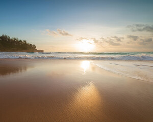 Fototapeta premium Serene beach at sunset with gentle waves lapping the shore and golden light illuminating the smooth sand, ai.
