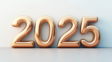 Large glossy golden numbers displaying the year 2025 against a white background, casting gentle shadows.