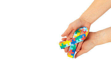 Autism ribbon. Autism awareness day. World autism awareness day with puzzle pattern ribbon isolated on white background. Colorful puzzle ribbon.