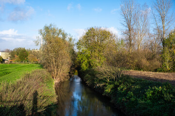 The river Senne and natual surroundings at the Groene Beemde nature reserve in Lot, Flemish Brabant, Belgium