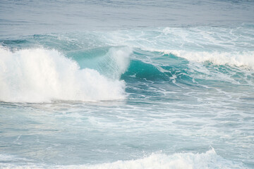 Dangerous high tide wave on the beach. Watu Karung beach, Pacitan, East Java, Indonesia.