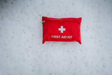 Compact Red First Aid Kit A crucial piece of safety gear that is essential for handling emergencies and perfect for outdoor adventures and activities in the wild