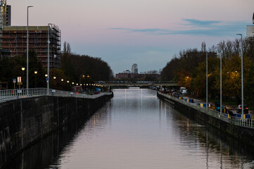 Colorful sunset over the canal at the Biestebroekkaai or Quai de Biestebroeck in Anderlecht, Brussels Capital Region, Belgium