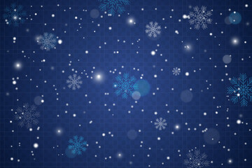 Winter background with snowflakes and bokeh effect.
