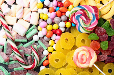 Mix of colorful candies . Top view
