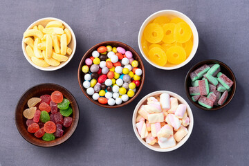 Mix of colorful candies . Top view