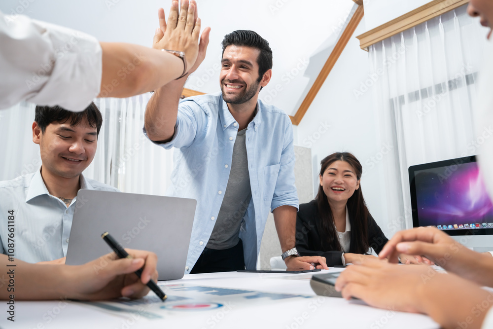 Fototapete Analyst team leader celebrate and high five together with his colleague after successful data analysis meeting using FIntech software power with business intelligence or BI dashboard. Prudent