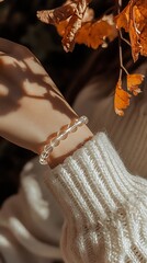 Fototapeta premium Stylish Autumn Vibes with Bracelet and Cozy Knit Sweater in Natural Light : Generative AI
