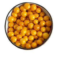 Macro of a bowl with golden berries