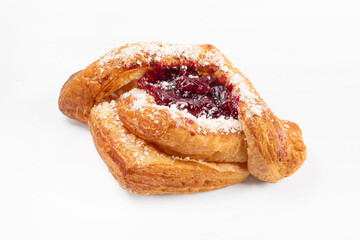 Close up puff pastry with redberry jam , isolated on white background