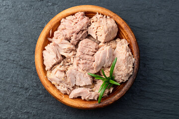 Canned tuna in bowl photography . Top view