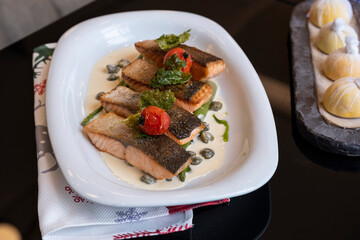 Oven baked salmon slices are ready to serve