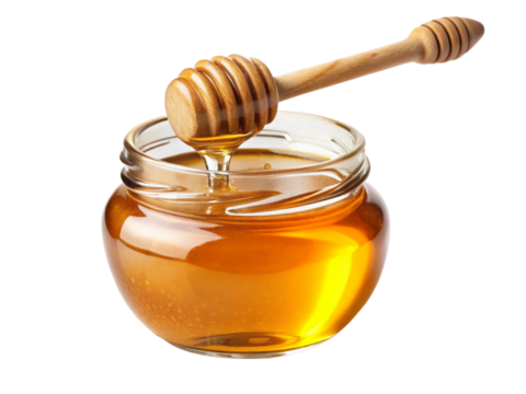 jar of honey with wooden dipper