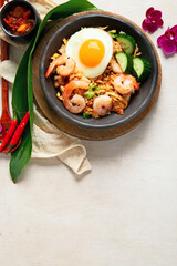 Nasi goreng- Indonesian fried rice with fried egg.