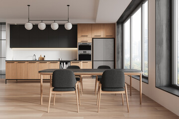 Stylish kitchen interior with wooden cabinets, black accents, and dining area. Large windows and wooden floor enhance modern design. 3D Rendering