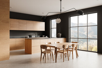 Modern kitchen interior showcasing wooden cabinets and dining table, with large windows and black walls. Concept of clean design. 3D Rendering