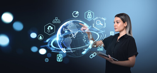 Woman interacting with digital virtual world interface, pointing