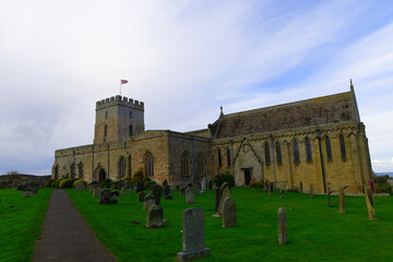 Fototapeta premium St Aidan's Church, Bamburgh, Northumberland, in November, 2024.