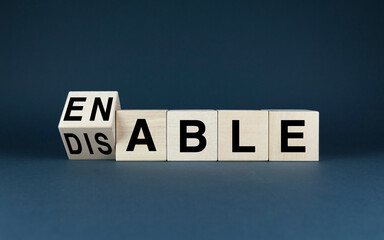 Wooden blocks spelling Enable or Disable
