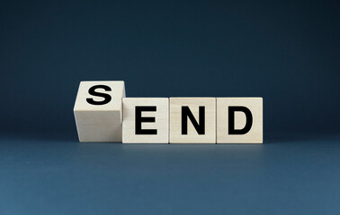 Wooden blocks spelling out SEND - END