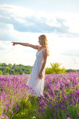 Woman in a lavender field. Selective focus.