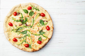 Italian pizza with avocado salmon  tomatoes and mozzarella photography. top view