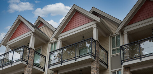 Modern townhouse with balconies. Real Estate Exterior Front House. Modern design homes. Family homes.