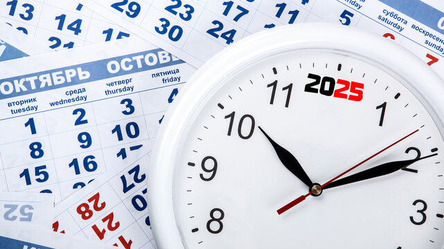 clock with wall calendar sheets with the number of days