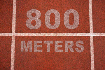 track and field - close up of track with start markings for 800m relay concept