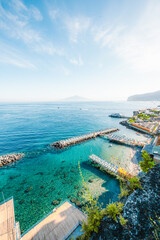 Streets in a touristic town, Sorrento near Amalfi coast, Italy. with a view of Naples and the Vesuvius volcano in the background