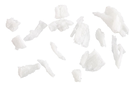 Fresh coconut flakes on white background, top view. Close-up