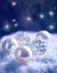 pearl jewelry christmas decoration on snow