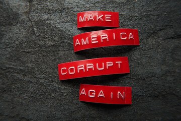 Make America Corrupt Again red labels on dark background