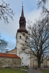 Streets, roofs, sights of Estonian Tallinn: autumn, sunny evening.