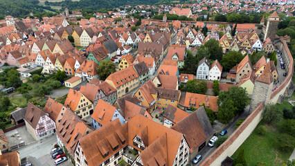 Naklejka premium Rothenburg ob der Tauber on the romantic route, the old town and watchtowers within the historical castle. Aerial photography by a drone