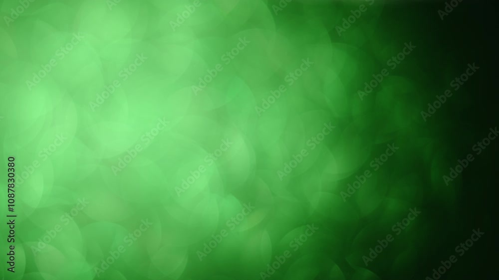 Wall mural Festive green bokeh glitter, 4K slow-motion with focus shifts for holidays.