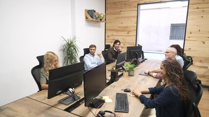 Business team having meeting discussing work in slow motion - Powered by Adobe