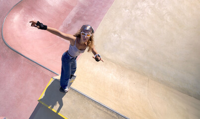 A skilled skateboarder is showcasing impressive tricks in a vibrant summer skatepark
