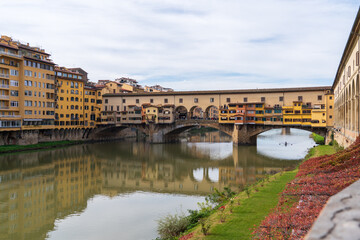 Fototapeta premium Florence, Italy - November 5, 2024: Florence cityscape and The Ponte Vecchio (Old Bridge).